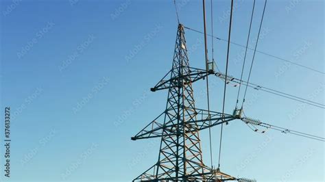 Transmission Tower Supporting An Overhead High Voltage Power Line The