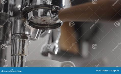 Low Angle Shot Of Coffee Extraction With Naked Portafilter Into White Cup Stock Image Image Of