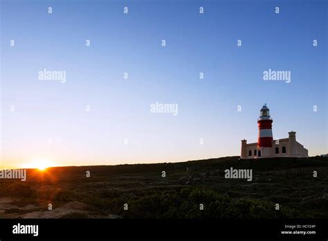 Agulhas Lighthouse At Southernmost Tip Of Africa At Sunset Agulhas