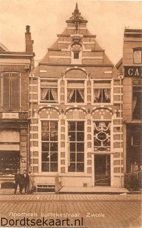 An Old Black And White Photo Of A Building