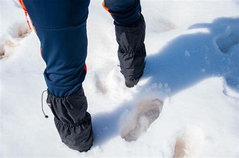 Premium Photo | Waterproof boots for hiking, shoes in the water. detail of men's climbing boots