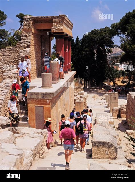 Tourists Visiting The Palace Of Knossos The Archaeological Site Of