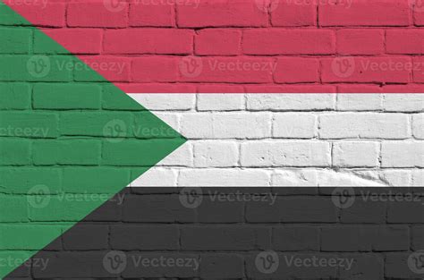 Sudan Flag Depicted In Paint Colors On Old Brick Wall Textured Banner