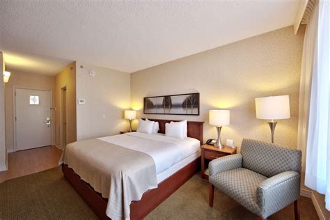 HOTEL MONTREAL AIRPORT | Relax by the Indoor Pool – Reserve a Room Today!