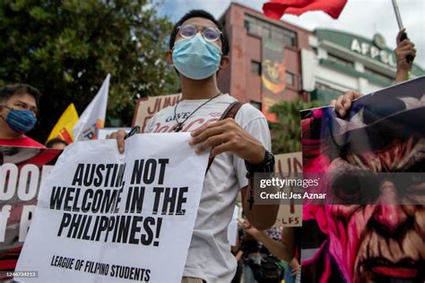 Activists Stage A Protest Outside The Gates Of Camp Aguinaldo Main