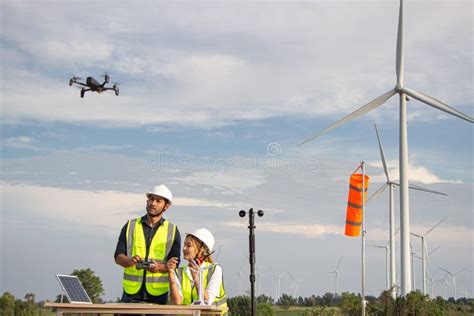 Engineer Team Working in Wind Turbine Farm. Renewable Energy with Wind ...