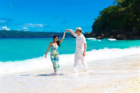 Loving Couple On Tropical Beach With Palm Trees Wedding O Stock Image