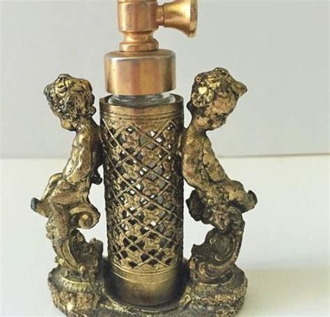 Perfume Bottle Gold Filigree Double Cherub Holder With Perfume Bottle