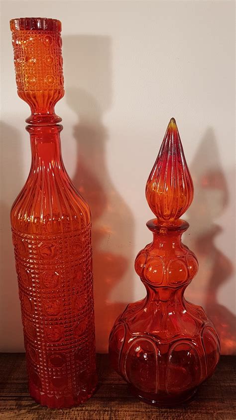 Pin by Ellen Simão on objetos Genie bottle Colored vases Glass art