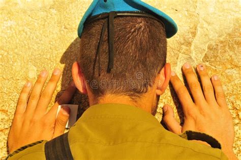 Soldier Praying At The Wailing Wall With Weapon Jerusalem Israel