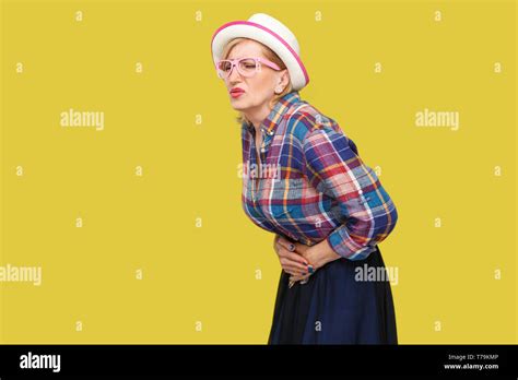 Stomach Pain Profile Side View Portrait Of Modern Stylish Mature Woman