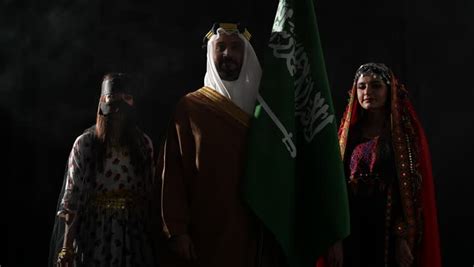 Portrait of a Saudi Arabian Gulf man wearing the traditional Saudi folk dress, national ...