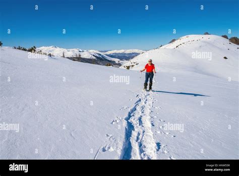 Female Figure Snowshoeing Plateau De Beille French Pyrenees Stock