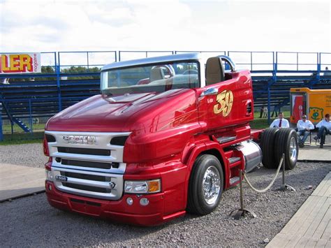 The Scania R999 V8 Red Pearl Is A Roadster Truck That Does Burnouts And