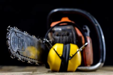 An Old Power Saw for Cutting Wood. Chainsaw and Protective Cloth Stock Image - Image of ...