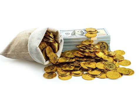 Stack Bundles Of 100 Us Dollars Banknotes And Gold Coin In Treasure Sack On White Background