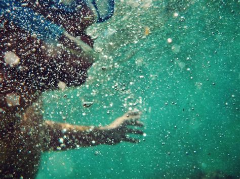 Premium Photo Person Swimming Underwater