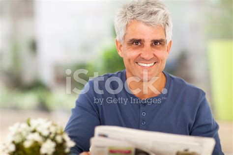 Mature Man Reading Newspaper Stock Photo Royalty Free FreeImages