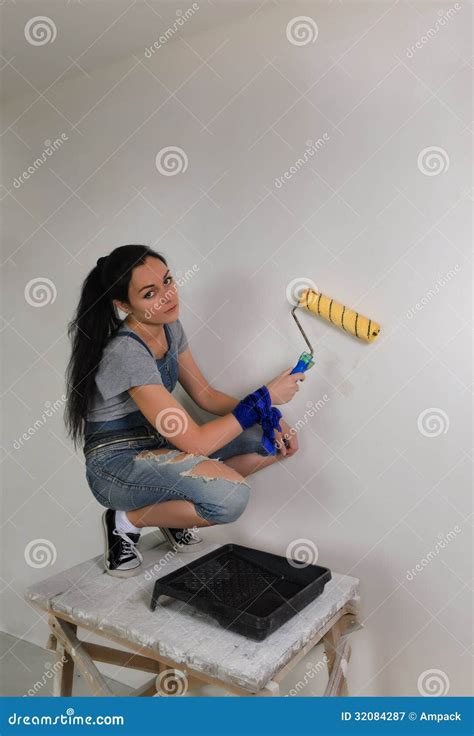 Girl Painting A Wall In Her House Stock Image Image Of Balanced