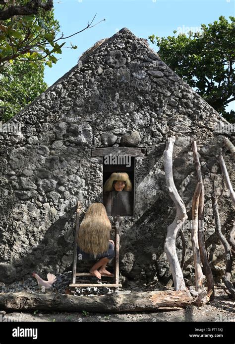 Ivatan woman, old stone house in Chavayan, Sabtang Island, Batanes ...