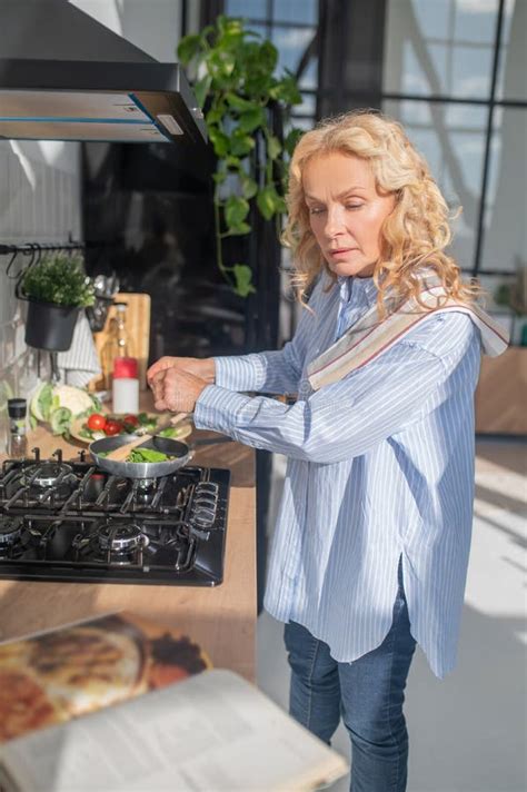 Blonde Mature Pretty Woman Cooking In The Kitchen Stock Image Image Of Woman Blonde 262820025