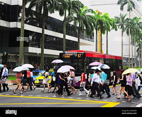 Singapore in the rain Stock Photo - Alamy