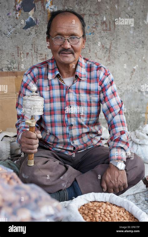 Leh Ladakh India The Main Bazaar Man With Prayer Wheel Selling