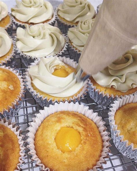 Mid Swirl Vanilla Cupcakes With Lemon Curd Filling And Vanilla