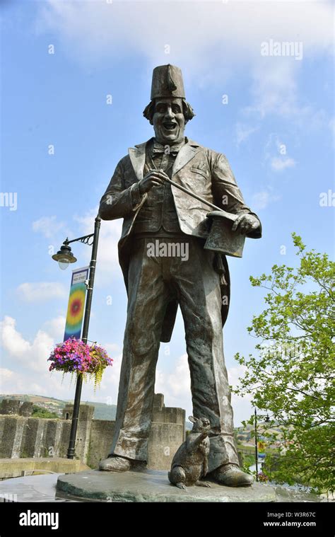 Bronze sculpture of the comedian Tommy Cooper stands 2.7m (9 feet) tall ...