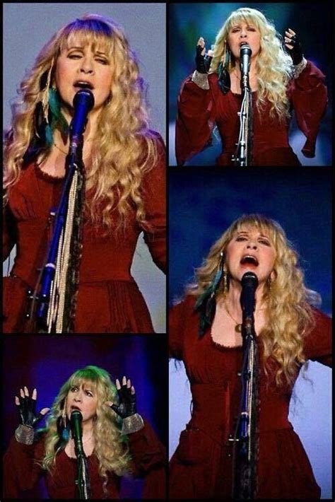 Stevie In Red With Long Curly Hair Performing Somewhere