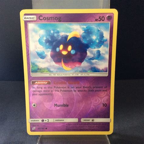 Cosmog Sun Moon Team Up Reverse Holo English Mint