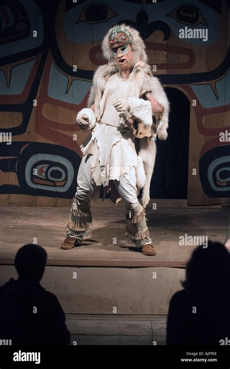 Actor wearing traditional Tlingit s actor mask and garbs performs ...