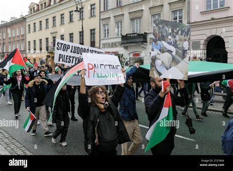 Participants March Through The Streets Of Warsaw During The March Of