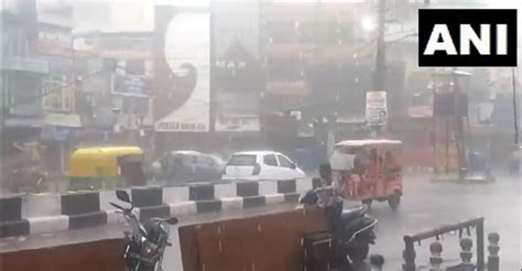 Heavy Rains Lash Delhi Ncr Brings Respite To People From Sultry Heat