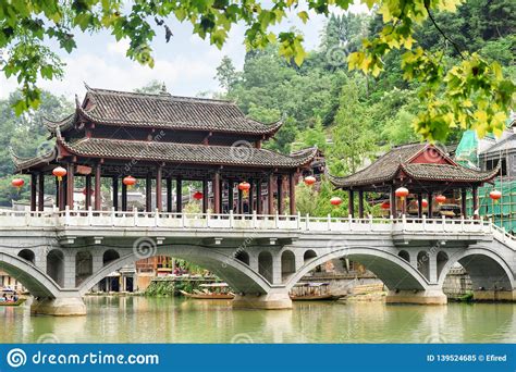 View Of Bridge Over The Tuojiang River Phoenix Ancient Town Stock