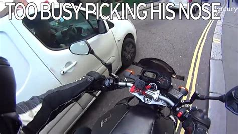 Motorcyclist Captures Moment He Was Nearly Knocked Down By A Driver Who He Claimed Was Picking