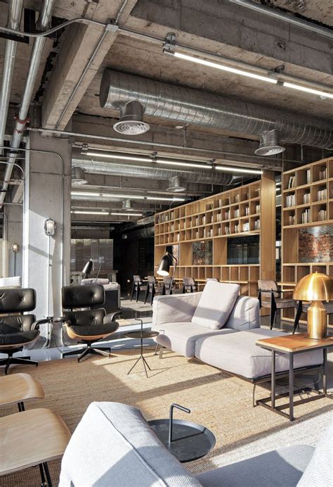 Industrial Office Features Exposed Bricks Concrete Ceilings