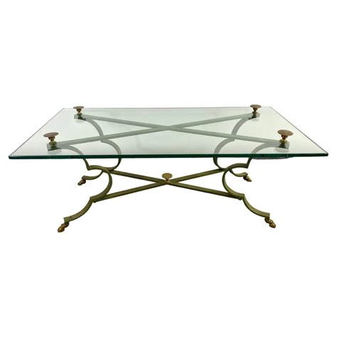 Brass and Cast Iron Coffee Table with Glass Top - AptDeco