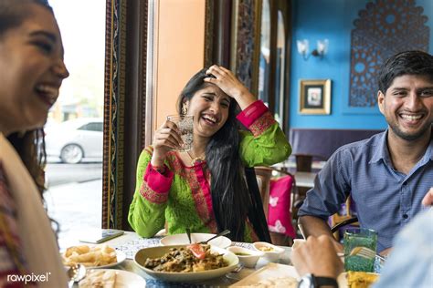 A Group Of Indian People Is Having Lunch Together Premium Image By