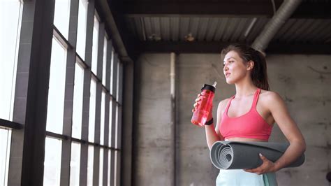 Fitness Woman Hydrating During Workout Break Stock Footage Sbv