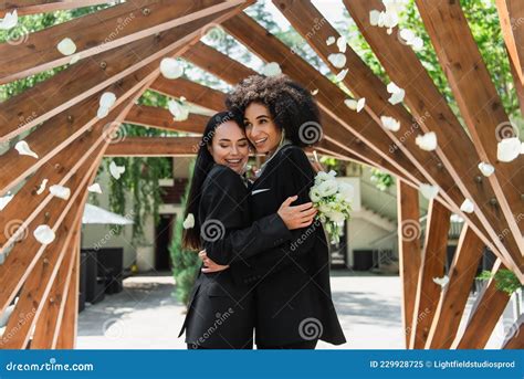 Happy Interracial Lesbian Couple With Wedding Stock Image Image Of Lgbt Embrace