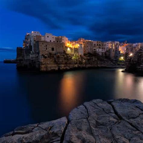 Moonlight Boat Tour to the Polignano a Mare caves | GetYourGuide