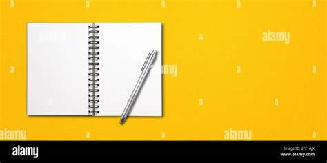 Blank Open Spiral Notebook And Pen Isolated On Yellow Banner Stock