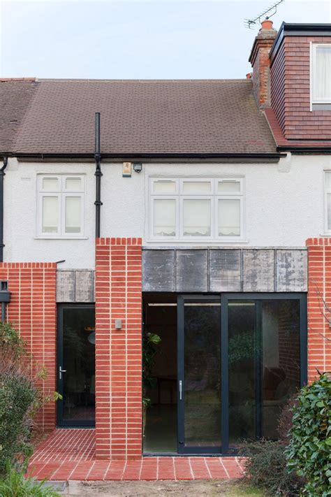 Hive House Extension With Unpretentious Brick And Timber Design