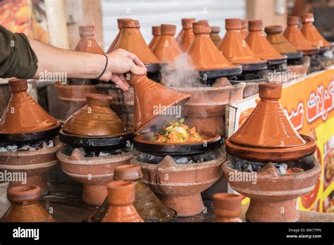 Preparing Food In Tajin Traditional Dish In Morocco Meat And