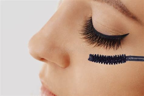 Female Eye with Extreme Long Eyelashes and Brush of Mascara. Make-up, Cosmetics, Beauty Stock ...