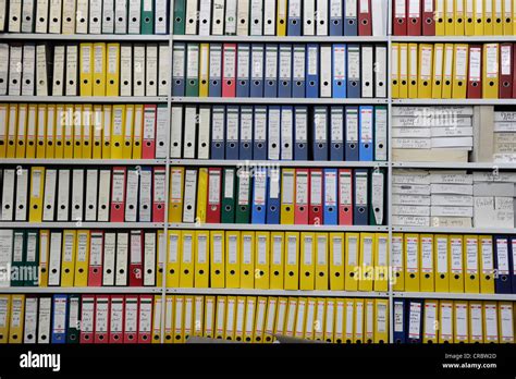 Coloured File Folders On A Shelf Stock Photo Alamy