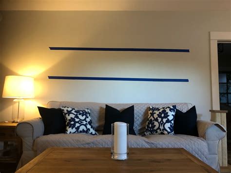 How High To Hang Picture Ledge Above Sofa Baci Living Room