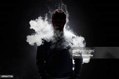 Vaping Man In Black Photos And Premium High Res Pictures Getty Images