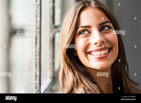 Portrait Of Smiling Brunette Woman Stock Photo Alamy